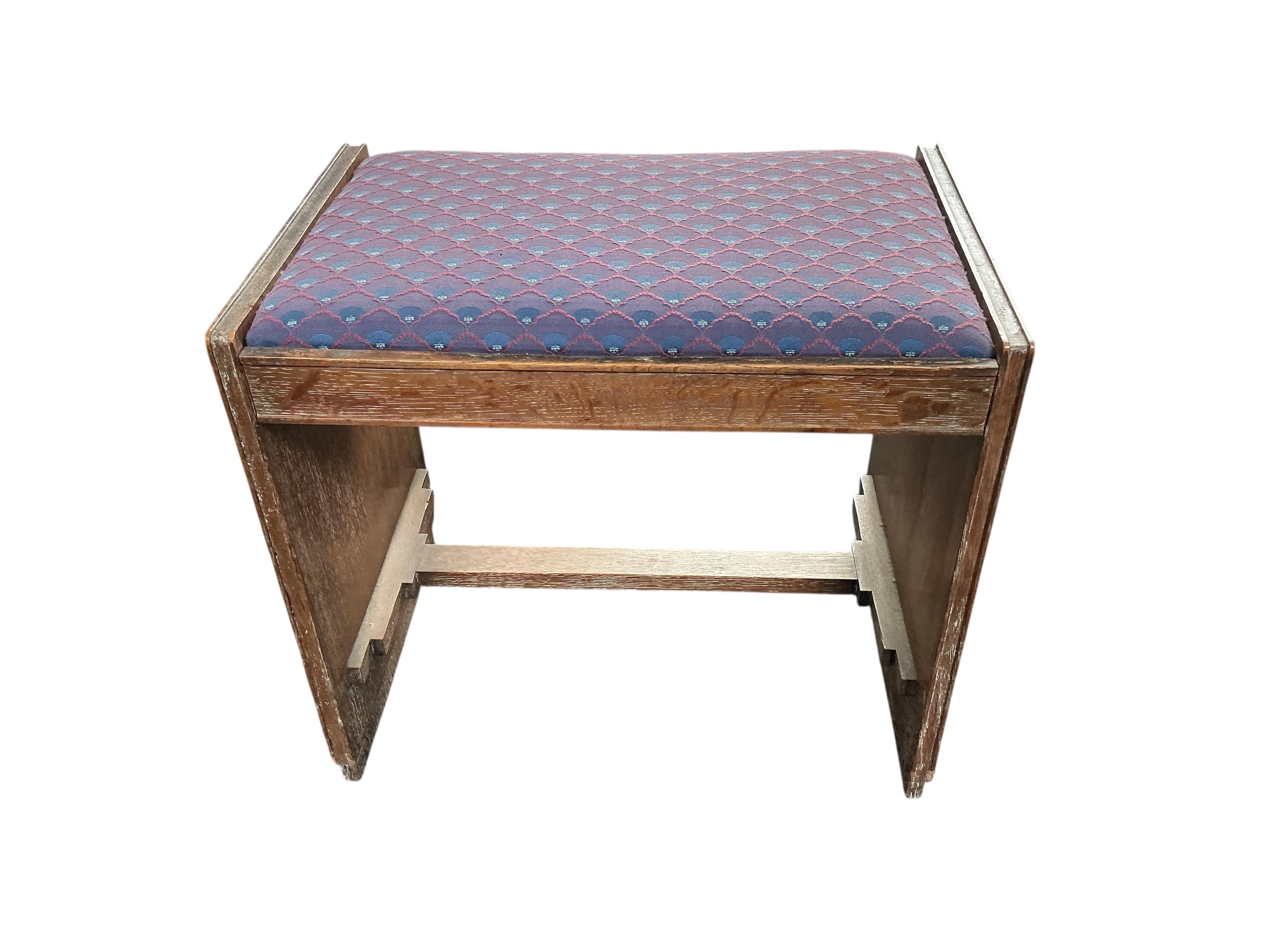 In the manner of Josef Hoffmann, an Art Nouveau oak chair-back settee and similar stool, settee width 110cm, depth 43cm, height 87cm.